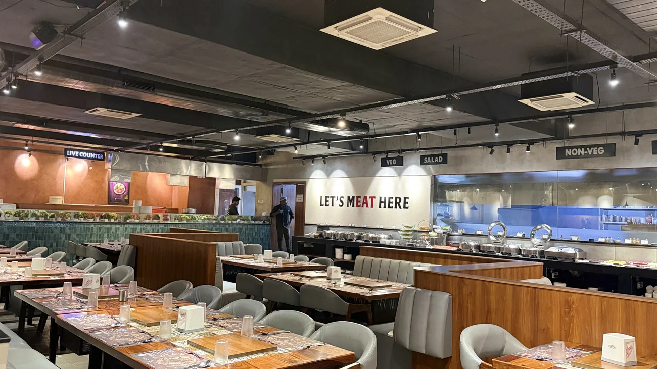Main dining hall with live grill counter at Food on Fire BBQ, Hanamkonda, Warangal